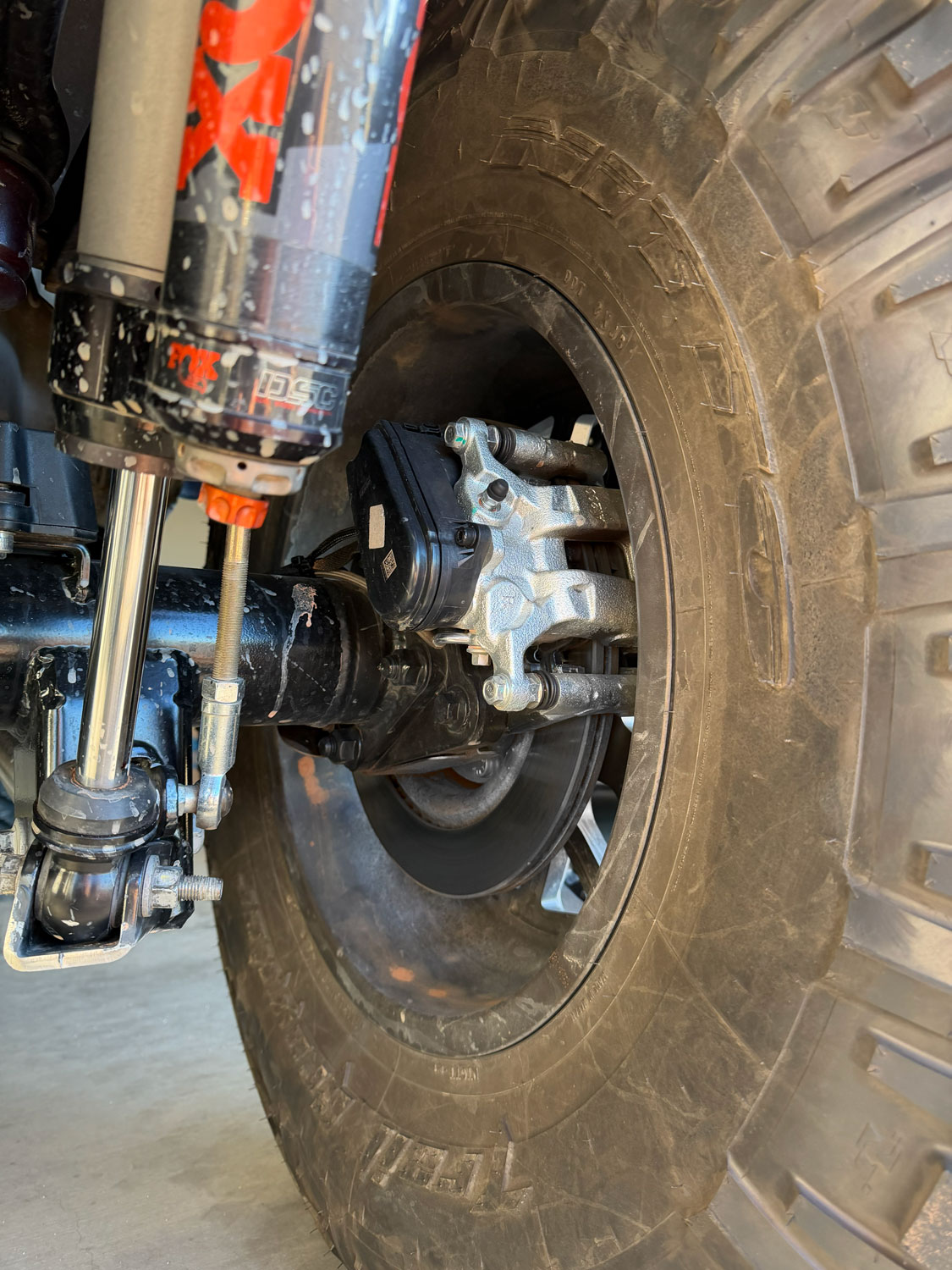 EPBX rear brake caliper with integrated electronic parking brake actuator