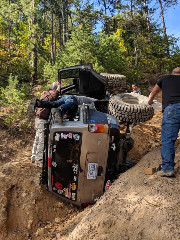 Jeep Cherokee on its side after rollover